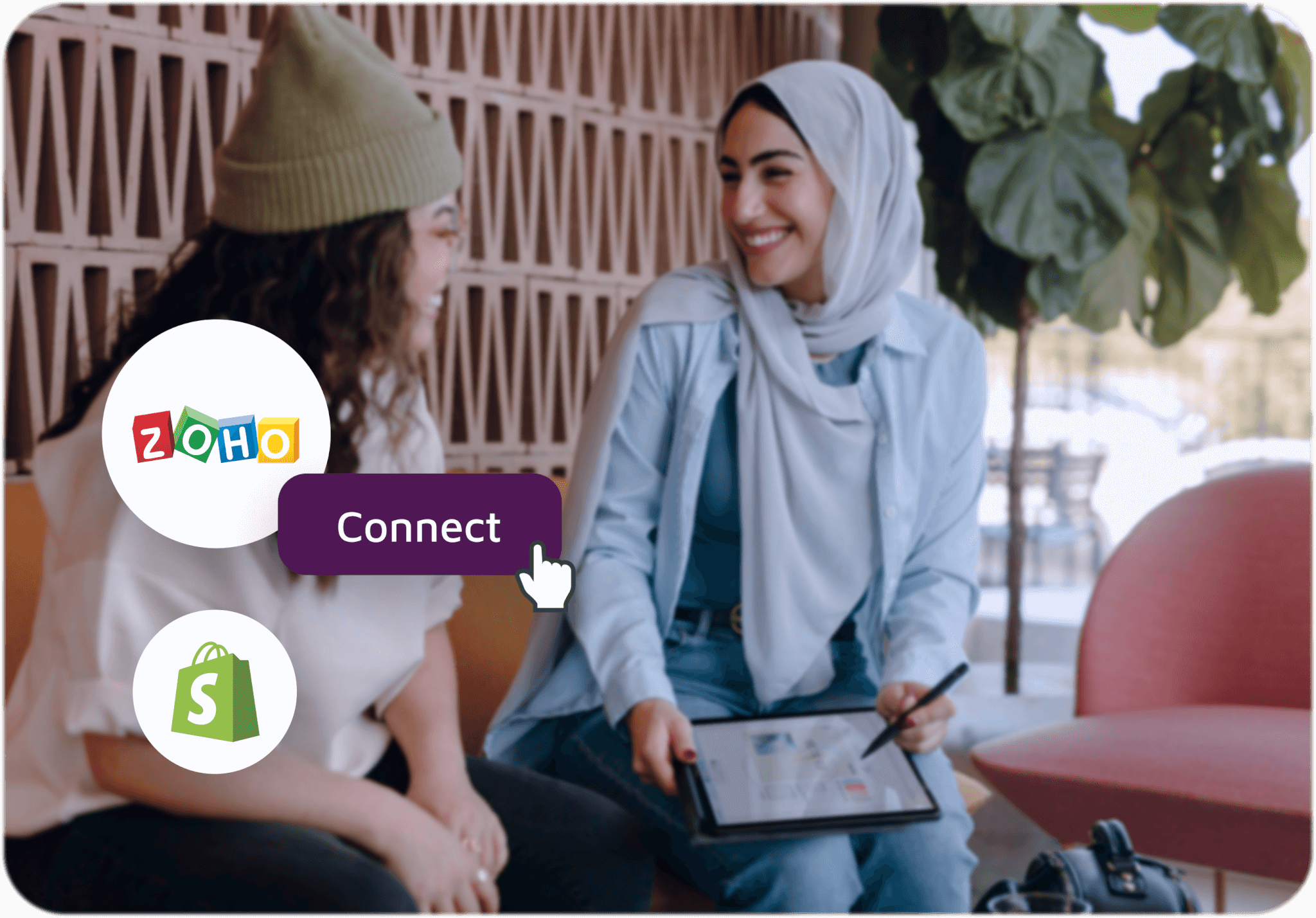 Two women with a tablet and Zoho and Shopify logos with a connect button