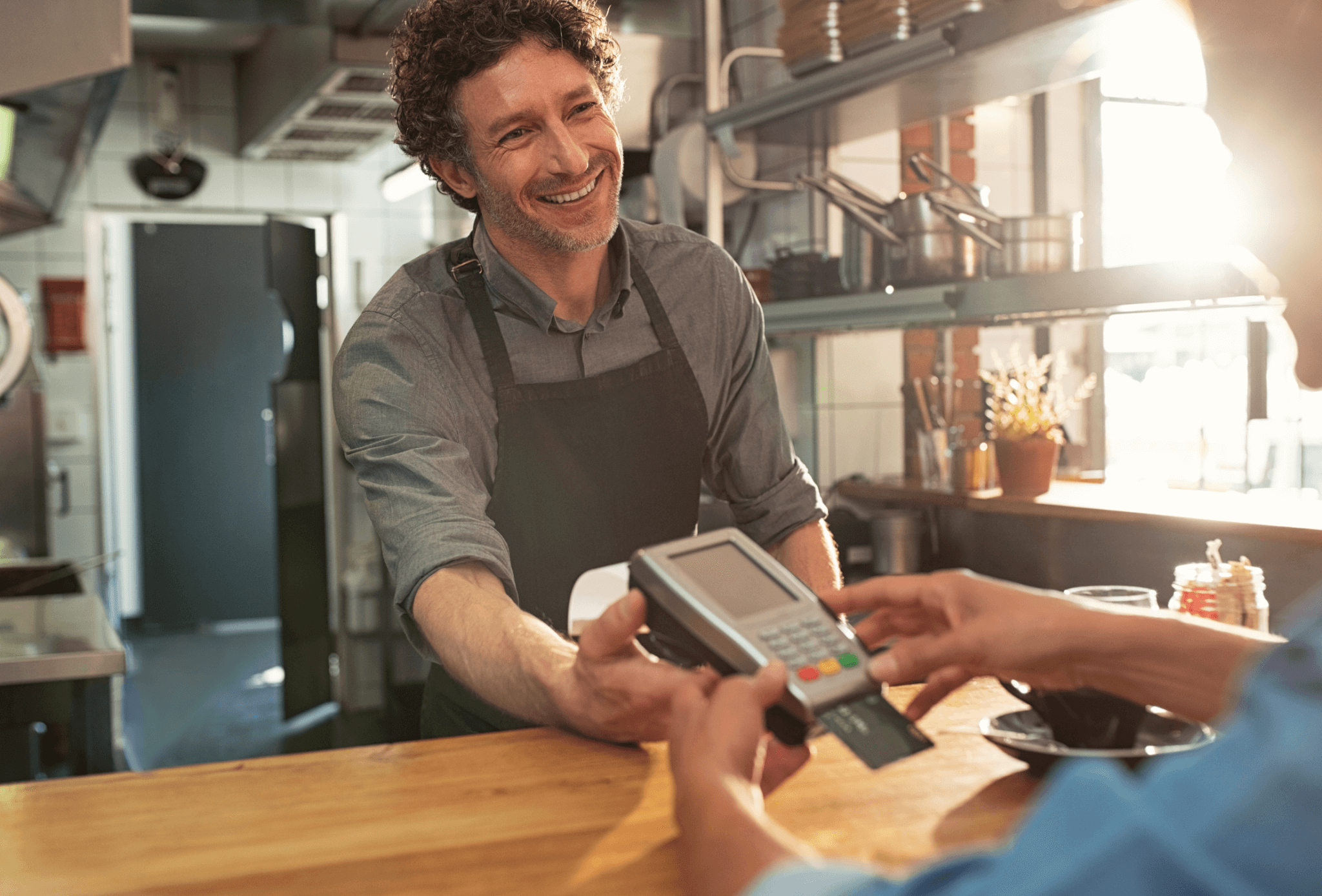 a merchant accepting card payment through POS